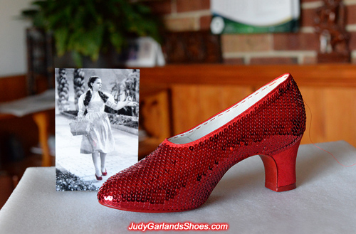 Working on the right shoe of Judy Garland's ruby slippers