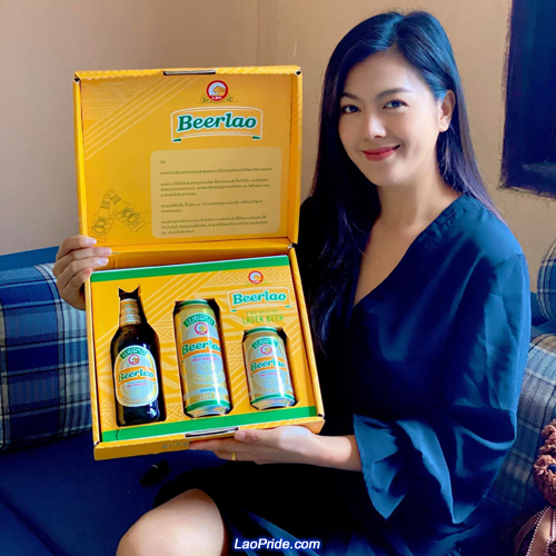 Lao girl holds Beerlao case box