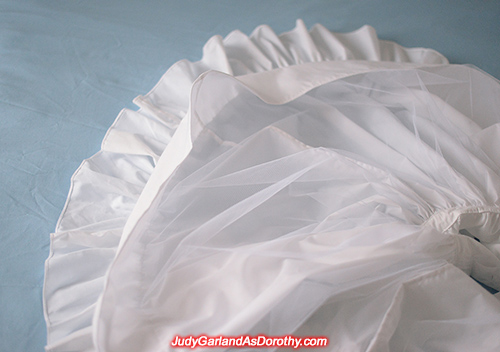 Netting under Judy Garland as Dorothy's slip