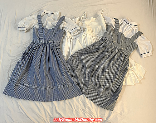 Two Dorothy gingham dresses, blouses and slips