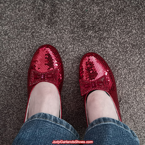 Woman wearing her size 6 ruby slippers